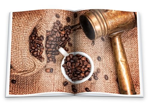 An opened  book with a picture Arabic old copper turks, cup and  scattered coffee grains