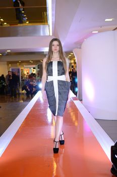 WROCLAW, POLAND - MARCH 23:  Polish model walks the runway at the Wroclaw's Designer School fashion show. Designers present their work in Renoma shopping plaza on March 23, 2013 in Wroclaw, Poland.