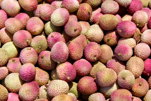 freshly cut fruits lychee as an agricultural background