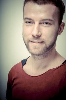 vintage portrait of fashion guy on gray background