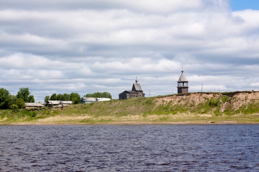 Landscape with big river and churches
