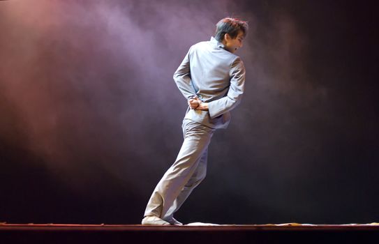 CHENGDU - DEC 11: professional modern dancer performs solo dance on stage at JINCHENG theater.Dec 11, 2007 in Chengdu, China.
Choreographer: Xiao Xiangrong, Chang Xiaoni, Cast: Sun Rui