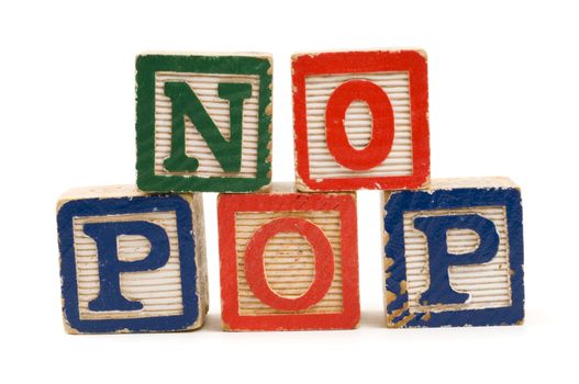 Children's wooden blocks spelling "No Pop"