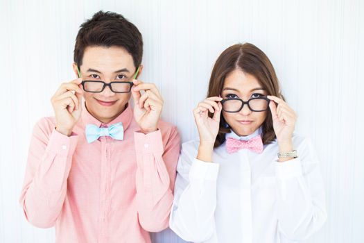 Happy Couples in living room with smart casual dress