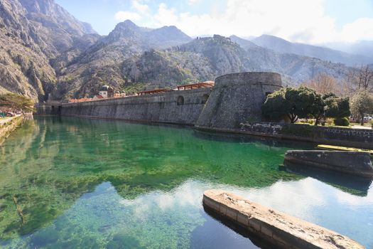 Unesco protected Kotor fortification and mountains in Montenegro