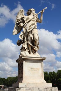Rome, Italy. One of the angels at famous Ponte Sant' Angelo bridge. Angel with the Lance by Domenico Guidi.