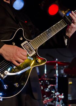 Musician playing the electric guitar at a blues festival