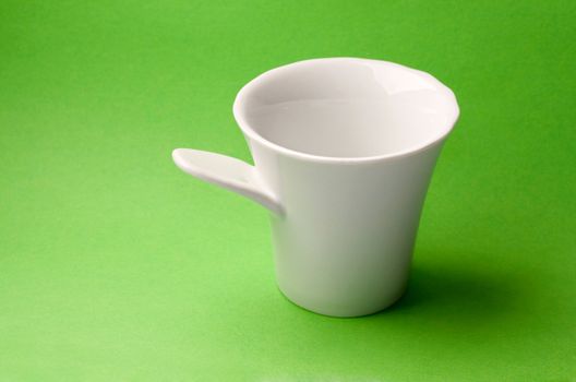 Mug isolated on green background
