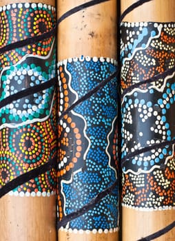 Close up of three wooden african wooden musical instruments