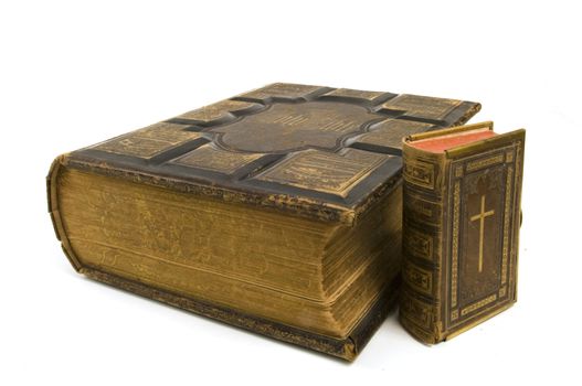 Large and Small Bibles on a white background