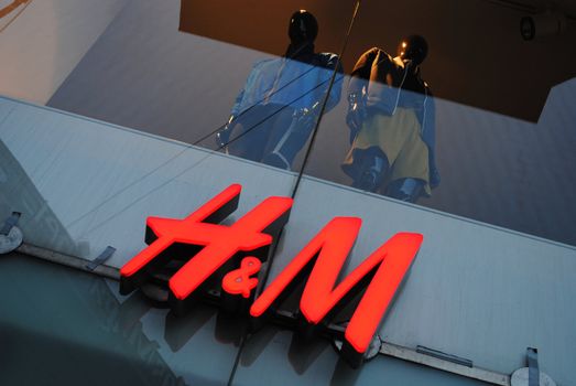 H & M Hennes & Mauritz AB (H&M) is a Swedish multinational retail-clothing company, known for its fast-fashion clothing for men, women, teenagers and children. H&M exists in 43 countries and as of 2011 employed around 94,000 people. It had 2,325 stores at end of 2011 and 2,629 stores at end of August 2012. It is ranked the second largest global clothing retailer, just behind Spain-based Inditex (parent company of ZARA).