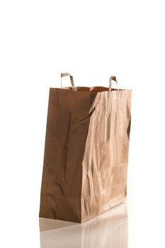 Side on shot of a paper bag isolated on white