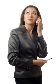 Photo of businesswoman talking via cellular phone on the white background