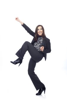 Successful businesswoman in trouser suit on a white background