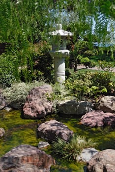 Stone lantern in traditional Japanese garden