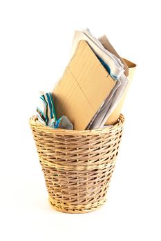 A waste paper bin on a white background