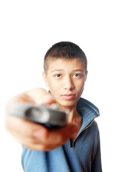 Studio photo of the boy with TV remote control device