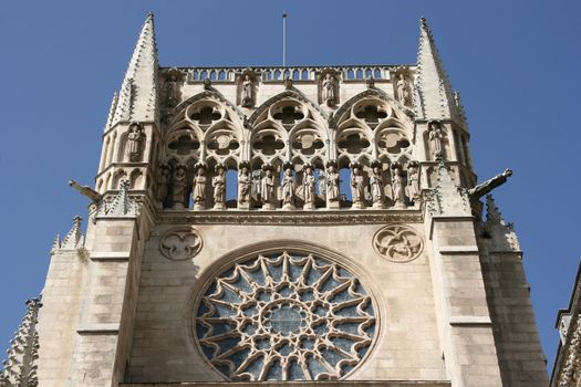 Tower of medieval cathedral in Burgos, Castilia, Spain. Old Catholic church listed on UNESCO World Heritage List.