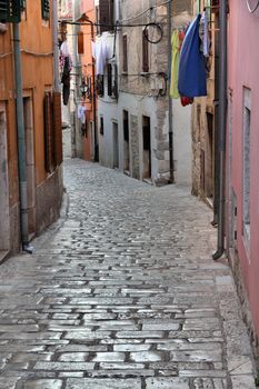 Croatia - Rovinj on Istria peninsula. Old town cobbled street.