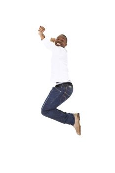 Young happy afro american man jumps in joy over white background.