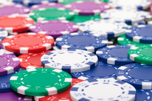 Background from of Multicolored Poker Chips, closeup