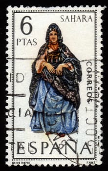 SPAIN - CIRCA 1970: A stamp printed in Spain shows a woman from Sahara series provincial spanish costumes , circa 1970.