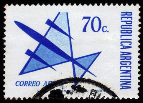 ARGENTINA - CIRCA 1963: A stamp printed in Argentina shows flight of symbolic airplane , blue, circa 1963