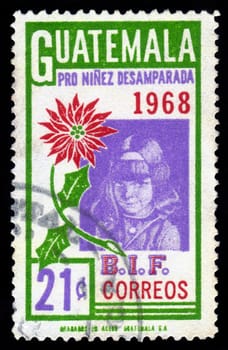 GUATEMALA - CIRCA 1968: A stamp printed in Guatemala shows portrait of a little girl , child, dedicated to abandoned and homeless children, circa 1968