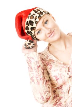 Sensual portrait of the woman with Santa Claus red cap