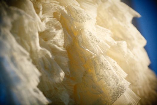 part of a wedding dress with artificial flowers