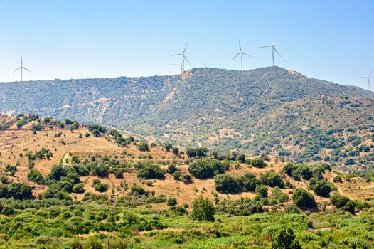 Traditional Cyprus landscape with wind farm