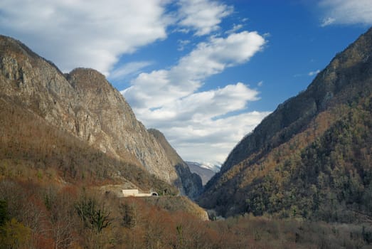 Mountain gorge with cloudy sky