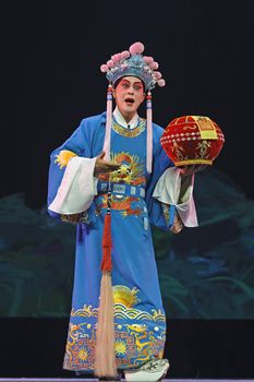 CHENGDU - JUN 5: chinese Sichuan opera performer make a show on stage to compete for awards in 25th Chinese Drama Plum Blossom Award competition at Chongzhou theater.Jun 5, 2011 in Chengdu, China.
Chinese Drama Plum Blossom Award is the highest theatrical award in China.