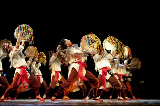 CHENGDU - SEP 28: chinese Qiang ethnic dance performed by song and dance troupe of Aba Tibetan and Qiang autonomous prefecture at experimental theater in the 6th Sichuan minority nationality culture festival.Sep 28,2010 in Chengdu, China.