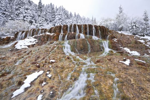 flying waterfall on lotus platform in the winter, huanglong, china