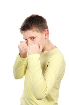 combative young boy in studio