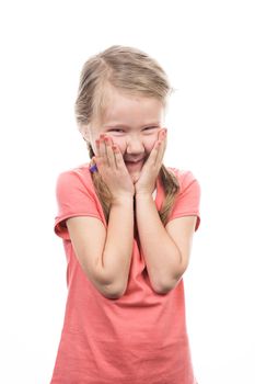 girl laughing with hands over mouth 