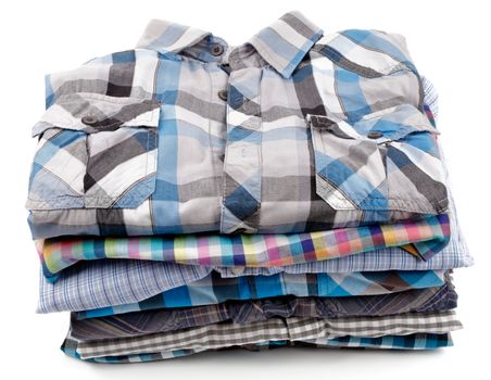 Stack of Various Plaid Men's Shirts isolated on white background