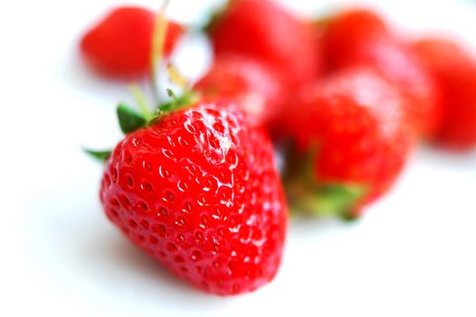 Macro view of Strawberry fruits on a white background