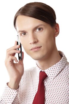 Successful businessman talking via cell phone on a white background