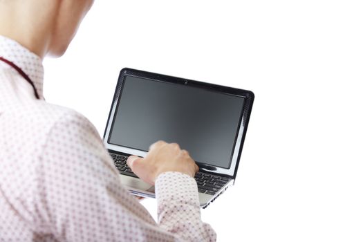 Unrecognizable businessperson using laptop on a white background