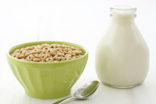 Delicious and nutritious lightly toasted honey, nuts and oats cereal with milk.