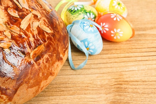 Typical homemade czech Easter Cake With Almonds and painted eggs