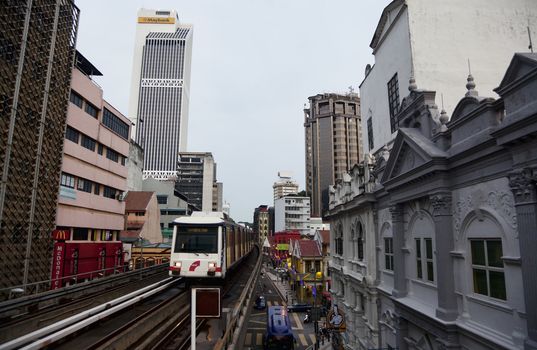 20 May 2012: Kuala Lumpur, Malaysia. LRT train arriving at Masjid Jamek station