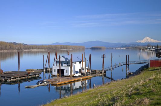 Floating house and Mt. Hood on the Columbia River Portland Oregon.