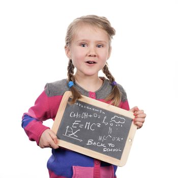 girl holding slate on white background