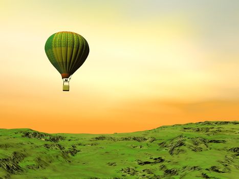 One colorful balloon flying in the evening yellow sky upon green grassland