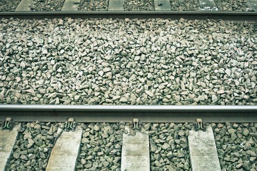 Railway tracks in detail in muted tones