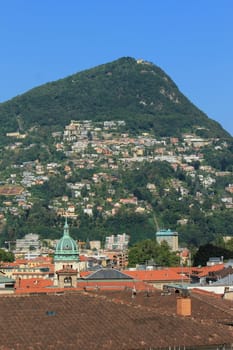 View of Lugano city with alps mountains, Switzerland