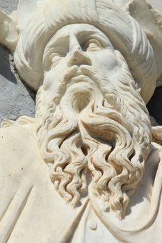 Detail of a sculpture on San Lorenzo Cathedral's facade at Lugano, Ticino, Switzerland